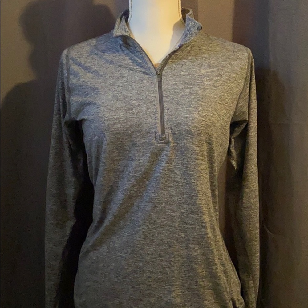 Nike’s zip pull over sweater
